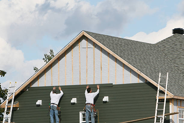Professional Siding Repair technician working in Riverside, MD
